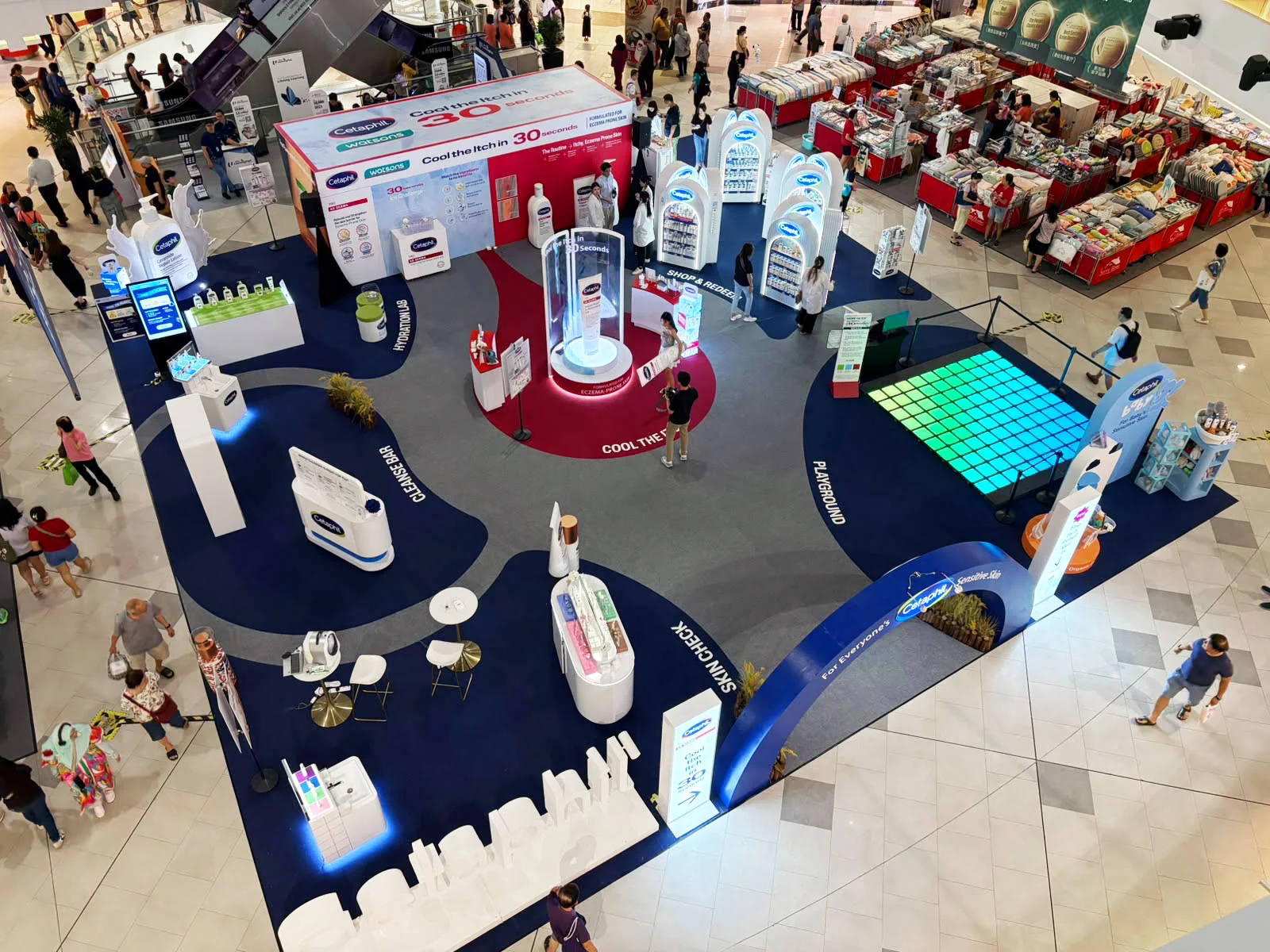 The finished roadshow seen from the floor above, matching the render