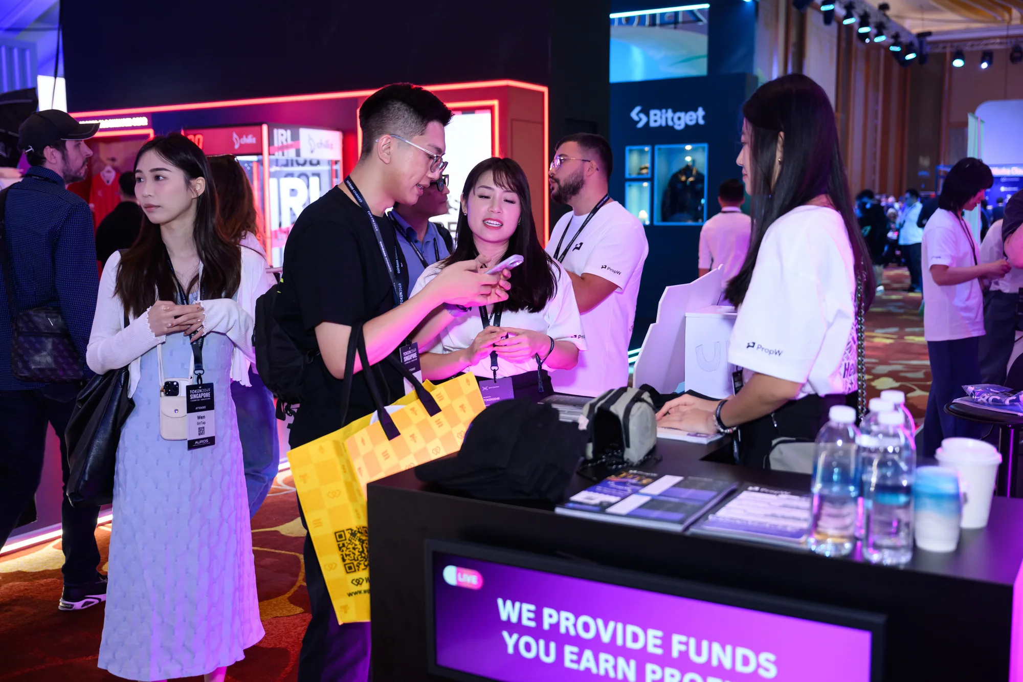 Visitors gathered at the PropW counter