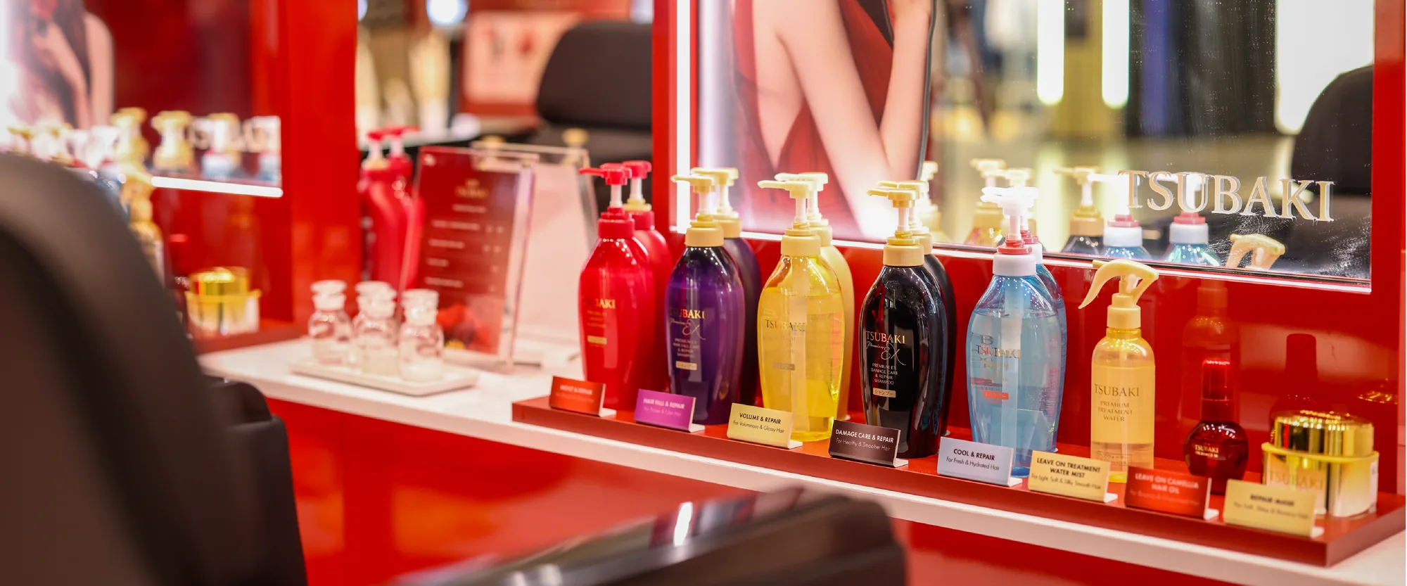 The TSUBAKI range lined up at a styling mirror